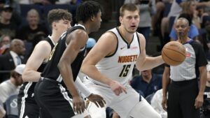 Juara bertahan Nuggets finis kedua di Barat, mengalahkan Grizzlies 126-111