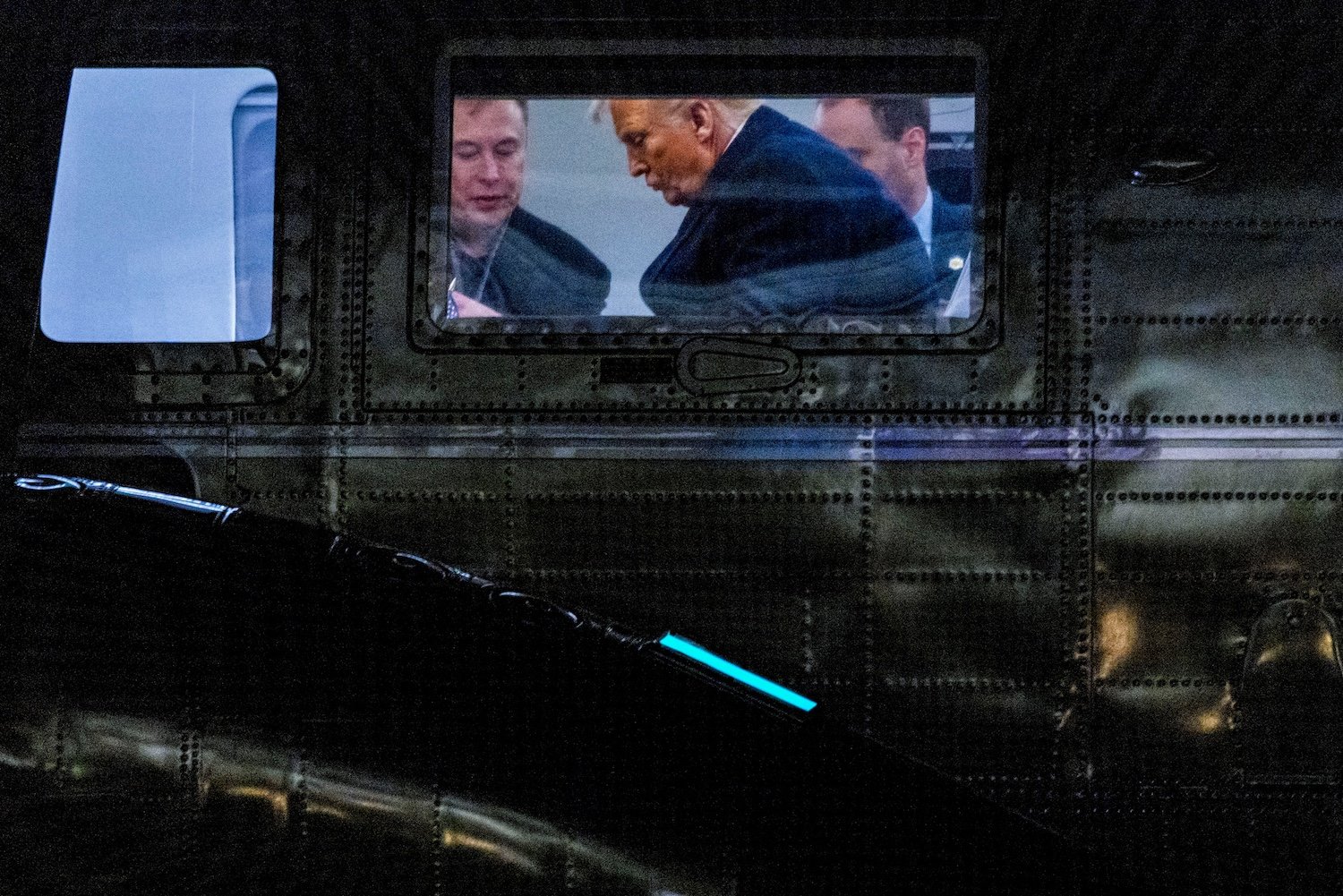 U.S. billionaire Elon Musk with President Donald Trump on Marine One after landing on the South Lawn of the White House in Washington, DC, on March 9, 2025.