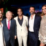 Dana Blumberg, Robert Kraft, Omeed Malik,, Donald Trump Jr., and Bettina Anderson attend amfAR Palm Beach Gala