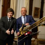 Argentina's President Javier Milei (left) and Robert F. Kennedy Jr., holding a chainsaw in a photo posted to Kennedy's X account on May 27. 2025.