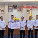 Pemkab Way Kanan Serahkan Bantuan Untuk Korban Bencana Alam Sumatera