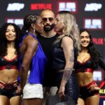 MIAMI BEACH, FLORIDA - DECEMBER 17: Caroline DuBois faces off against Camila Panatta during the press conference for Jake Paul v Anthony Joshua at The Fillmore Miami Beach on December 17, 2025 in Miami Beach, Florida. (Photo by Megan Briggs/Getty Images for Netflix)